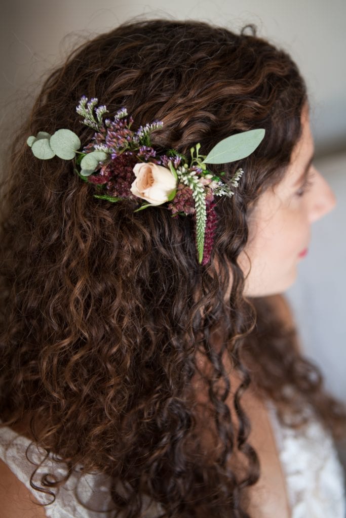 McCall Weddings Floral creates custom floral hair pieces for bride